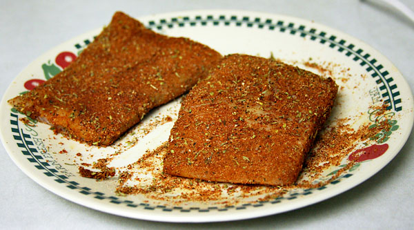 The fish with the spice applied, right before cooking.