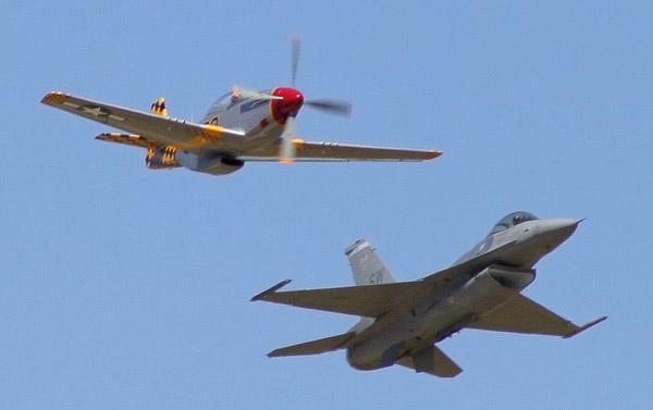 Canon 10D, 1/750 f/8.0 ISO 200, 300mm. I took this fairly terrible pic at a speed of 1/750 by mistake, and look at the prop on the Mustang - almost stationary. Don't do this!
